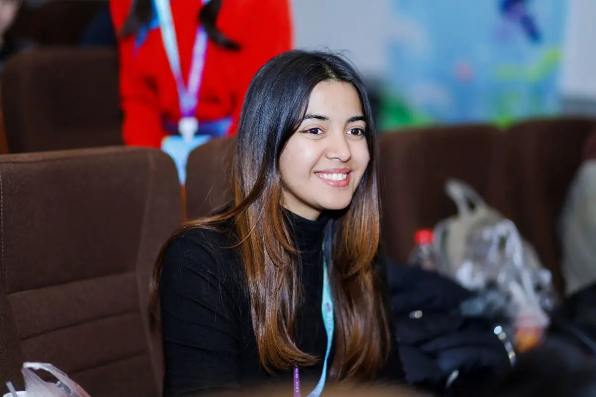 Renata smiling at a language and culture event